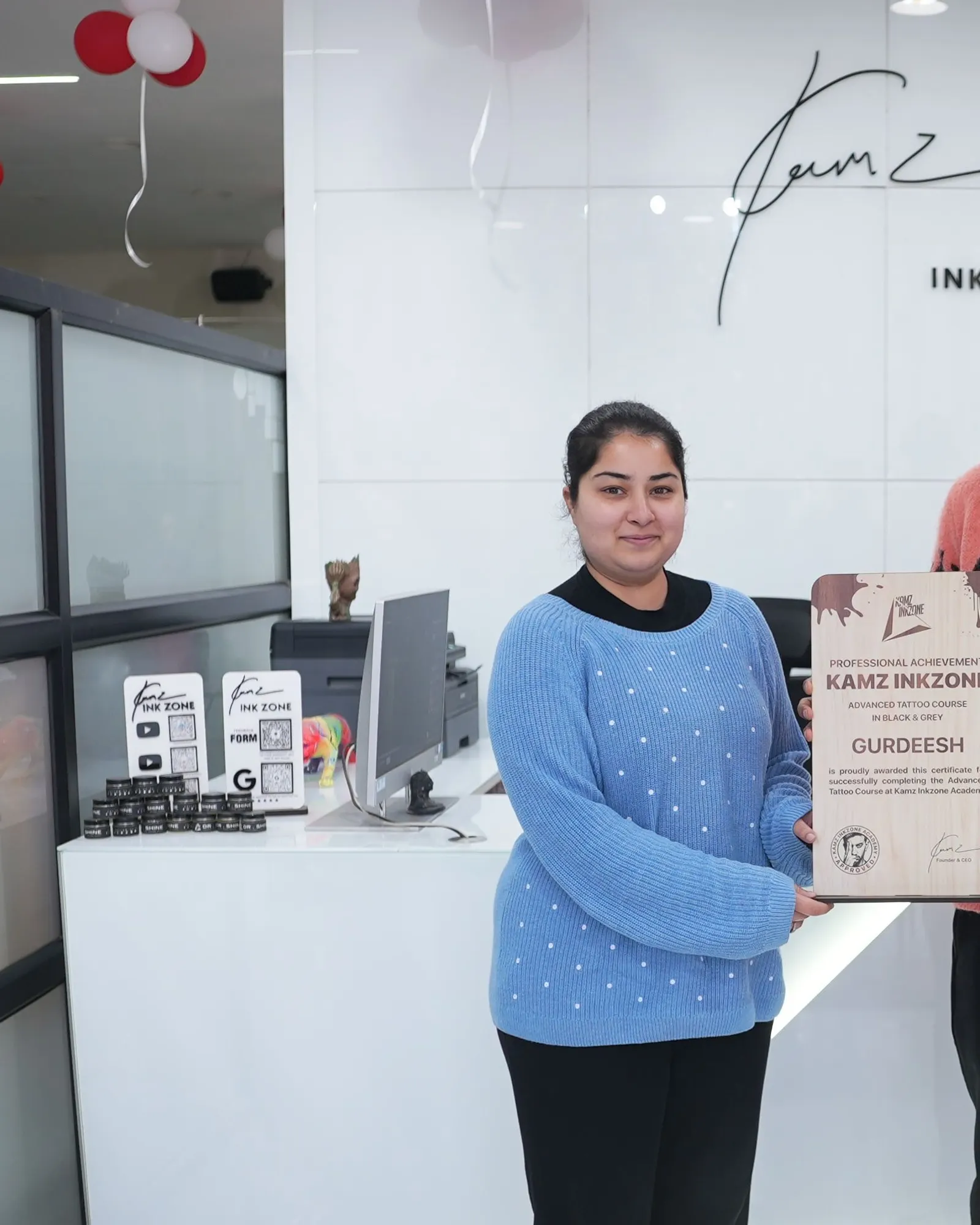 Gurdeesh, holding the Kamz Inkzone Academy Advanced Tattoo Course certificate