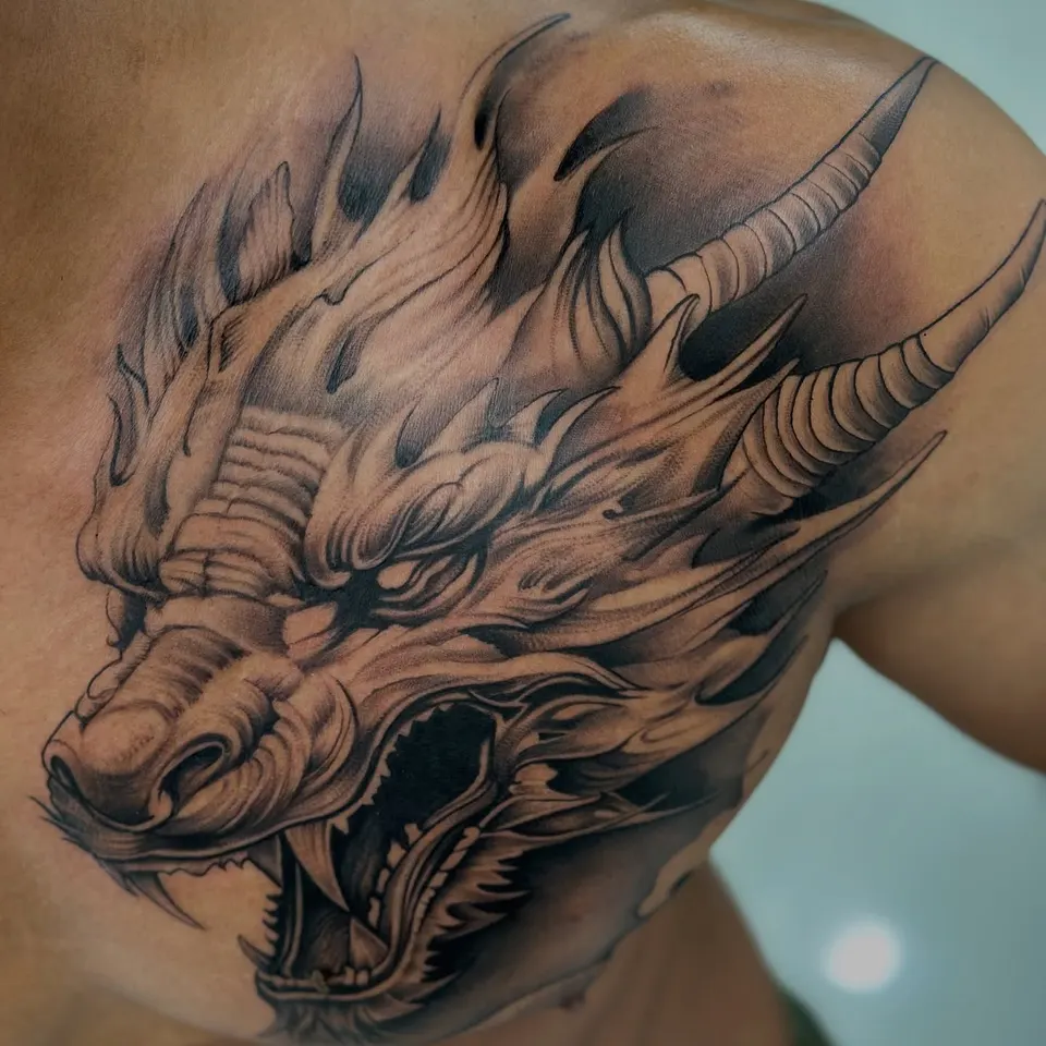 Dragon Head Shoulder tattoo by Kamz at Kamz Inkzone