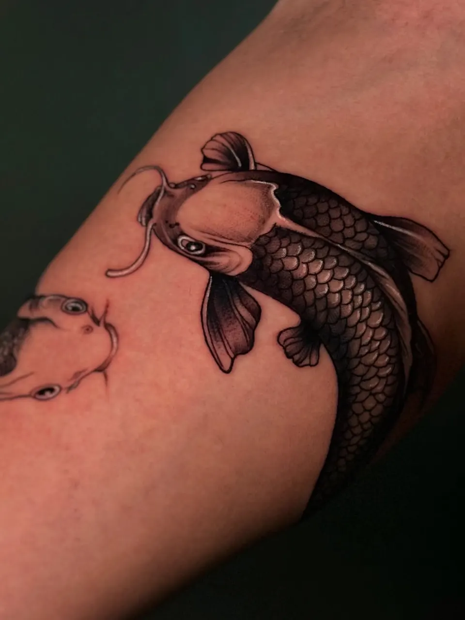Koi Fish Arm tattoo by Divinya at Kamz Inkzone