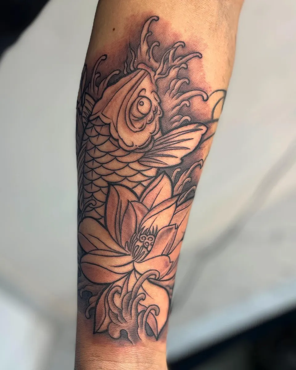 Koi Lotus Forearm tattoo by Kamz at Kamz Inkzone