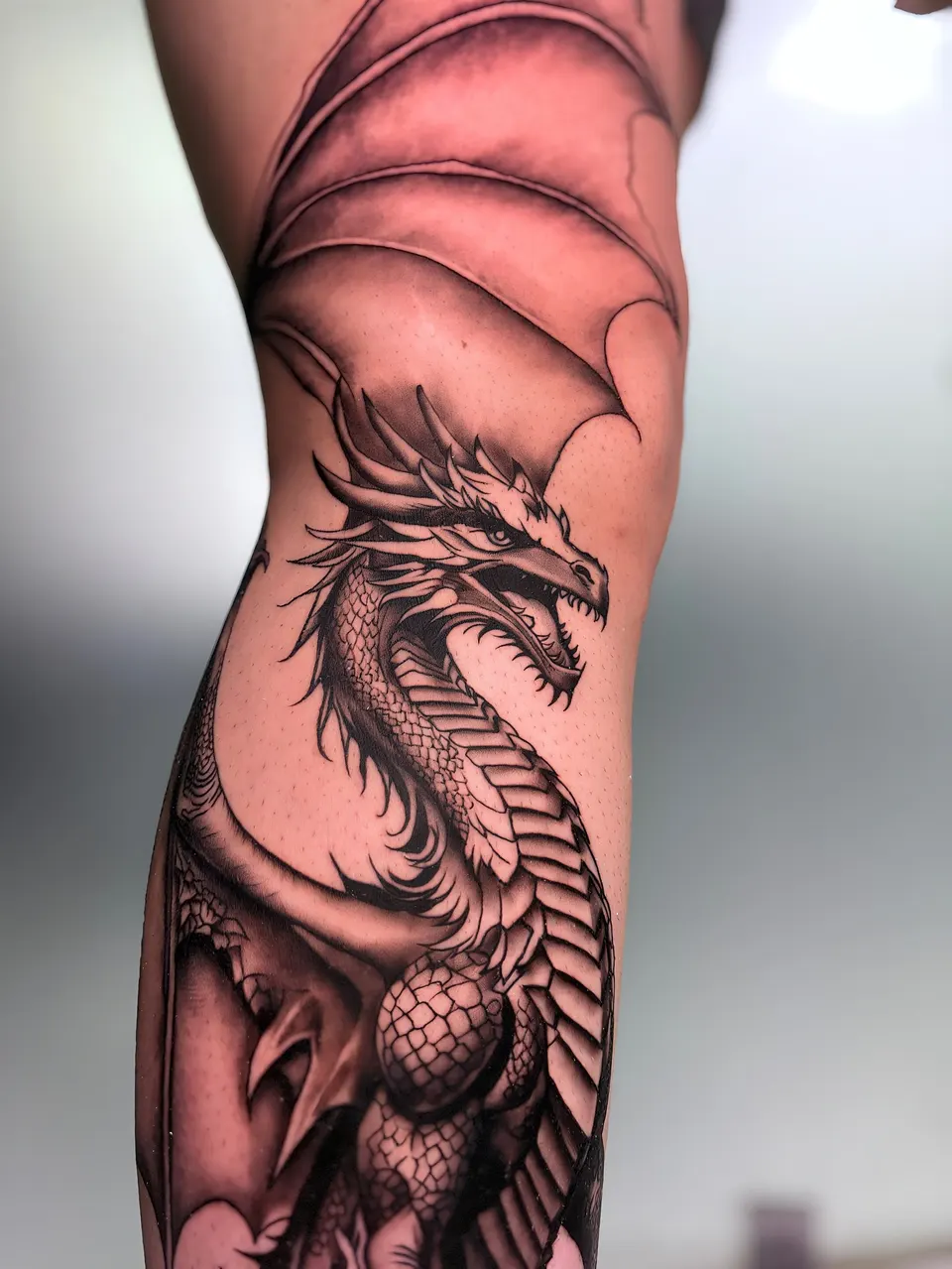 Winged Dragon Calf tattoo by Kamz at Kamz Inkzone